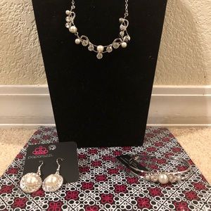 Necklace, bracelet and a pair of earrings